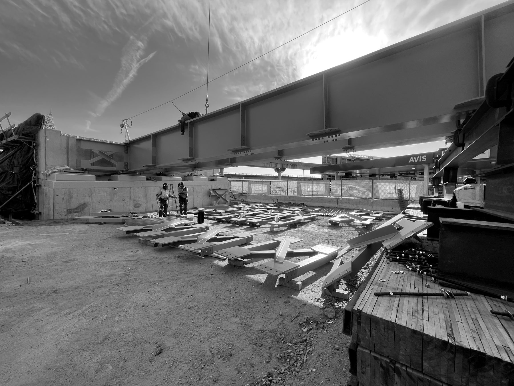 Structural steel erection above an active airport roadway